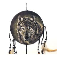 Dream Catcher wolf head on a fabric print with feathers and beads hanging from strips. Dreamcatcher Wall Hanging: Closeup View - Click to enlarge