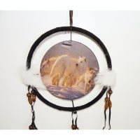 Dream Catcher with round canvas print of a pack of white artic wolves in the snow. Dreamcatcher Wall Hanging: Closeup View - Click to enlarge