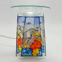 Dolphins jumping out of water three sided stained glass style electric oil tart warmer with dimmer dial in box: Front - Click to enlarge