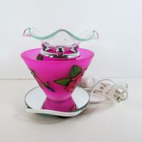 Electric scented oil tart warmer featuring a raised etched rose design against a deep pink background: Right Side View - Click to enlarge