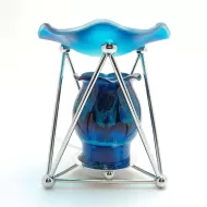 Electric oil warmer with melting blue colors on a triangular metal frame. Frostie blue dish. Nightlight: Front