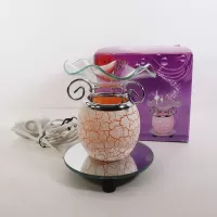 Electric scented oil tart warmer with white crackle design on orange background. Round mirror base: In Box View - Click to enlarge