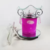 Electric oil warmer featuring a pink night sky of white stars, moon and clouds mounted on a round mirror base: Back - Click to enlarge