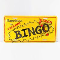 Happiness is Yelling Bingo License Plate Sign. Winning bingo card with black and red lettering on a yellow background: Front View