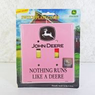 John Deere double light switch plate cover with iconic John Deere logo on a pink background: Front View