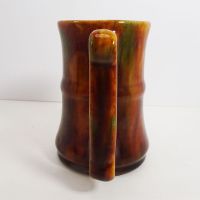 Vintage Brown Glazed Stoneware Mug with Finger Stop Handle and Subtle Color Changes: Back View - Click to enlarge