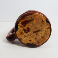 Vintage Brown Glazed Stoneware Mug with Finger Stop Handle and Subtle Color Changes: Bottom View - Click to enlarge