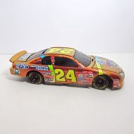 Jeff Gordon gold 1:24 scale No. 24 Action 1998 Chevrolet Monte Carlo Nascar 50th Anniversay diecast car bank with key: Right Side View