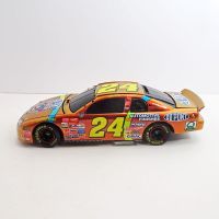 Jeff Gordon gold 1:24 scale No. 24 Action 1998 Chevrolet Monte Carlo Nascar 50th Anniversay diecast car bank with key: Left Side View - Click to enlarge