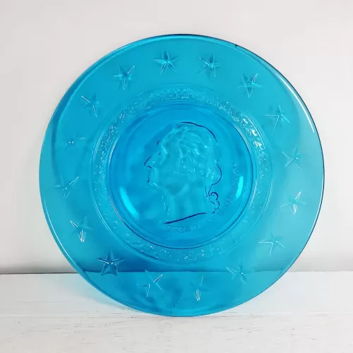 George Washington 8 inch Wheaton blue glass presidential plate with stars and Presidential wreath: Top View