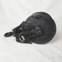 Vintage wood pulley with 5-1/2 inch wood wheel and metal cast iron case or frame with swivel eye. All painted black: Left Side View - Click to enlarge