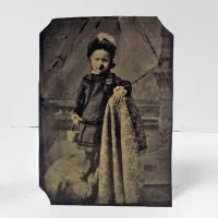 Antique Tintype Photo: Little girl standing sideways on a chair holding a basket: Front View - Click to enlarge