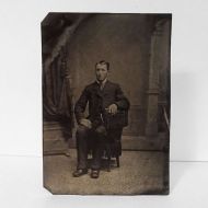 Antique Tintype Photo: Man sitting, wearing a jacket with one button fastened. No hat: Front View