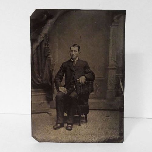 Antique Tintype Photo: Man sitting, wearing a jacket with one button fastened. No hat: Front View