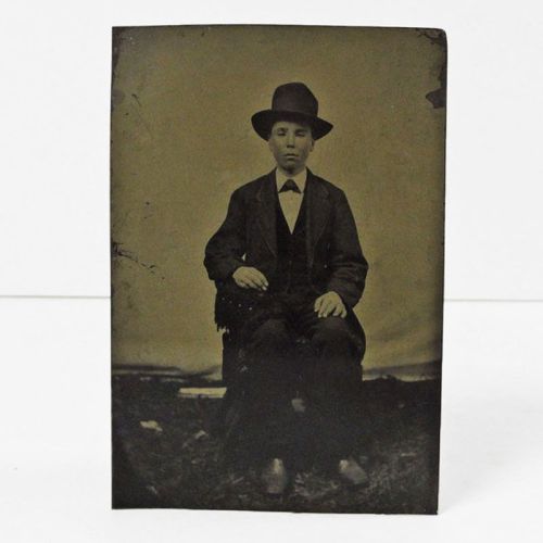 Antique Tintype Photo: Man sitting, wearing a button down vest with jacket and a big hat: Front View