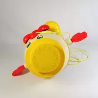 Vintage Fisher Price Humpty Dumpty pull toy with original yellow pull wire. Red hands spin when toy is pulled: Top - Click to enlarge