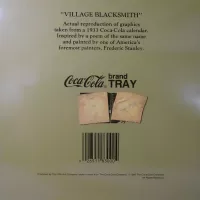 Vintage 1987 Coca Cola metal tray wall hanging shows a blacksmith and boy drinking coke from a bottle: Story View - Click to enlarge