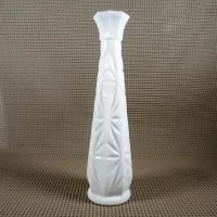 Vintage milk glass bud vase with fluted octagon top and diamond starburst design: Left - Click to enlarge