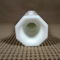 Vintage milk glass bud vase with fluted octagon top and diamond starburst design: Inside - Click to enlarge