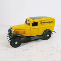 Ertl Montgomery Ward diecast metal 1932 Ford delivery truck coin bank with key in box: Left Side View - Click to enlarge