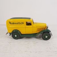 Ertl Montgomery Ward diecast metal 1932 Ford delivery truck coin bank with key in box: Right Side View - Click to enlarge